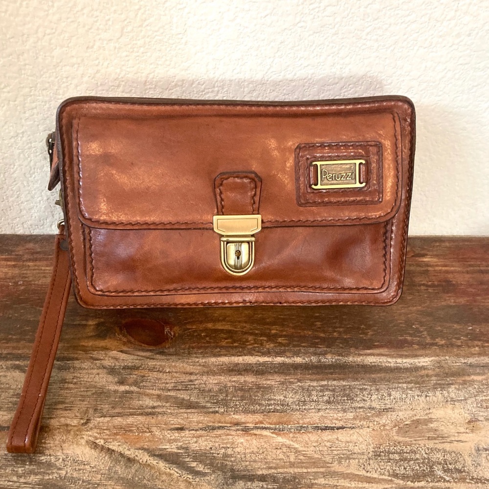 Vintage Peruzzi leather clutch. 9.5”x6”